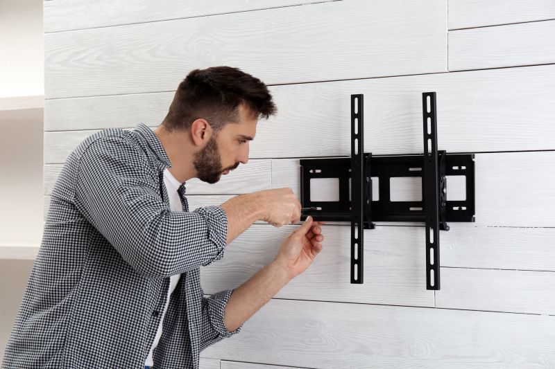 Handyman Installing a Shelf